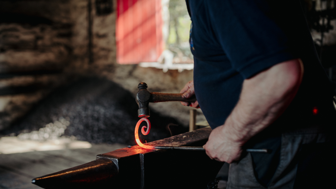 Hammering hot metal to make a poker