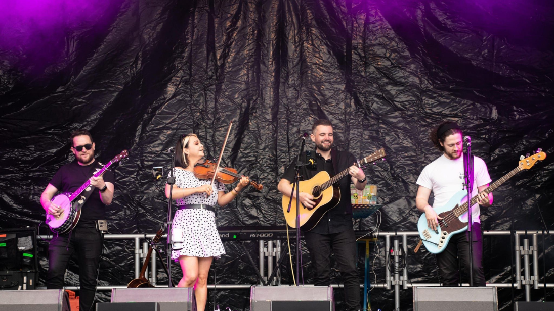 Cool Hand String Band playing on stage