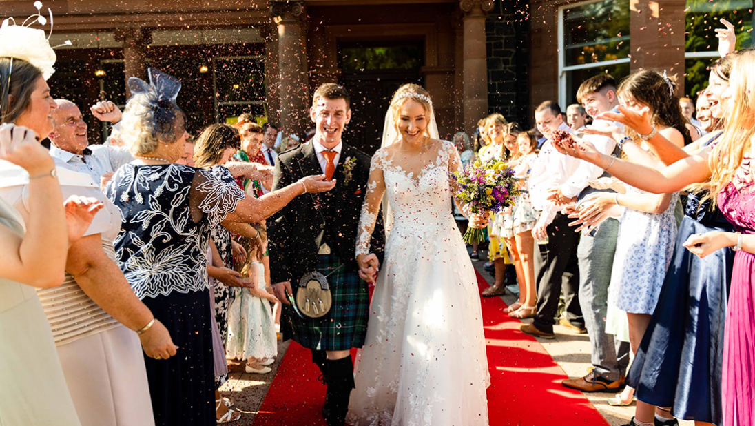 Wedding couple leaving the Manor