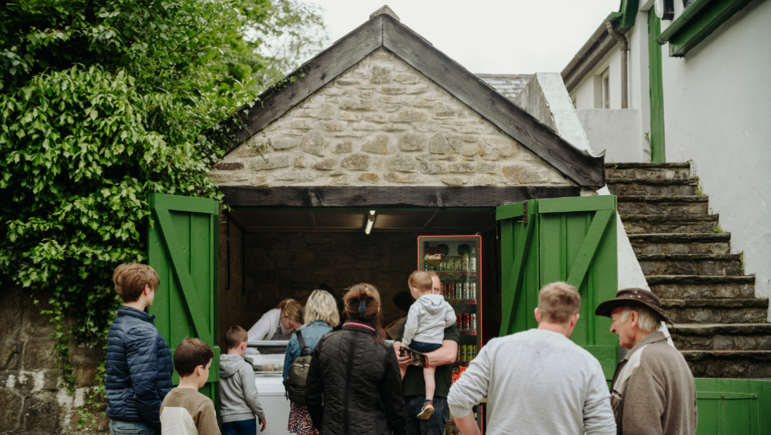 Parents and children queuing for ice cream