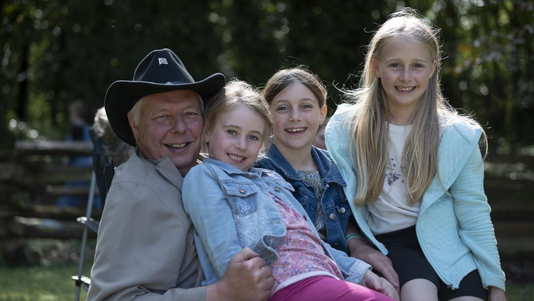 A group of four posing for the camera