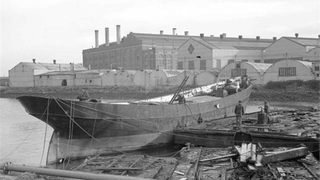 Result with her masts, spars and rigging removed, prior to ship being lifted into the Building Dock.