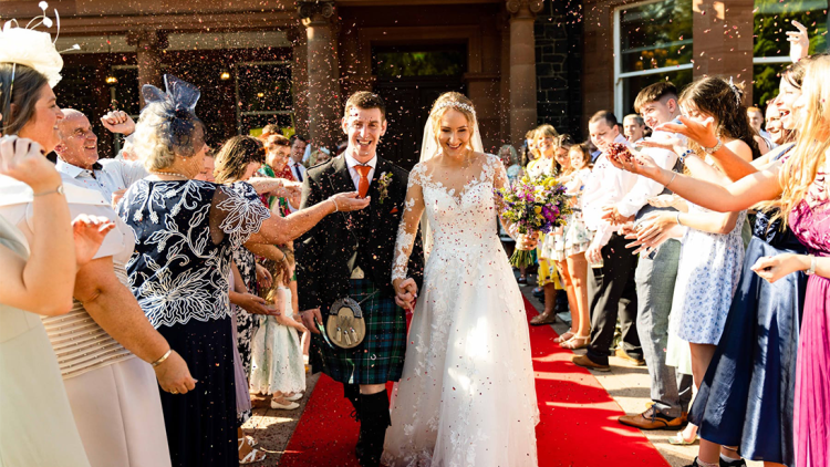 Wedding couple leaving the Manor