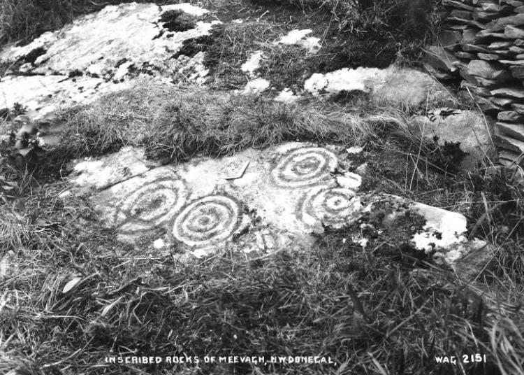 A stone carved with ancient symbols.