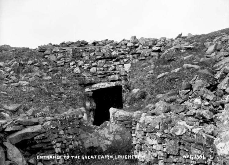A photograph of the entrance of a cairn.