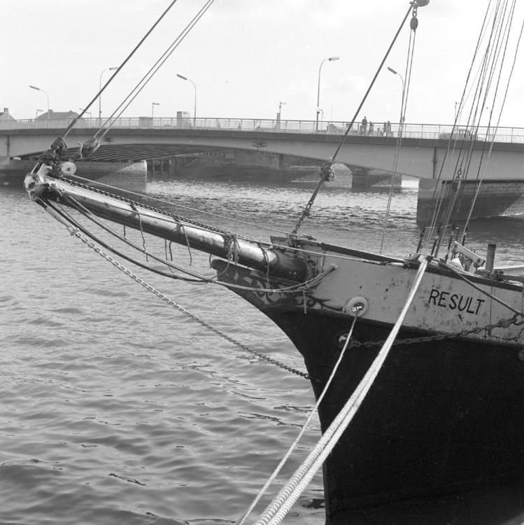 Queens Bridge is visible in the background. Result’s caretaker occasionally had to deal with youths throwing stones off the bridge at Result.