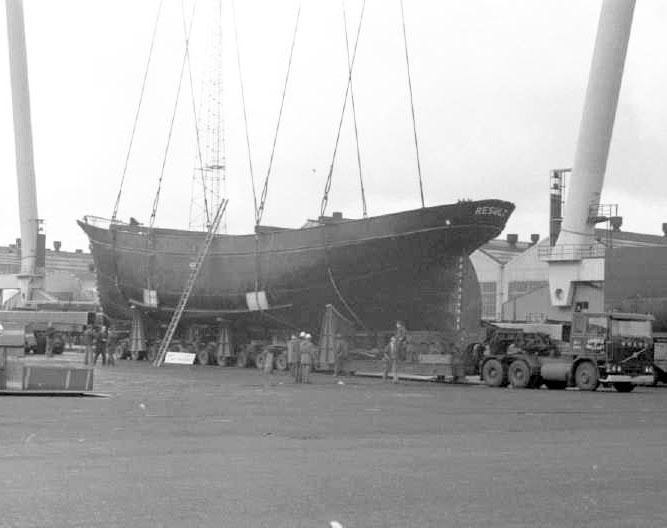 Result being lowered onto the road transporter.