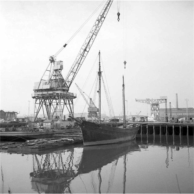 Result having her masts, spars and rigging removed, prior to ship being lifted into the Building Dock.