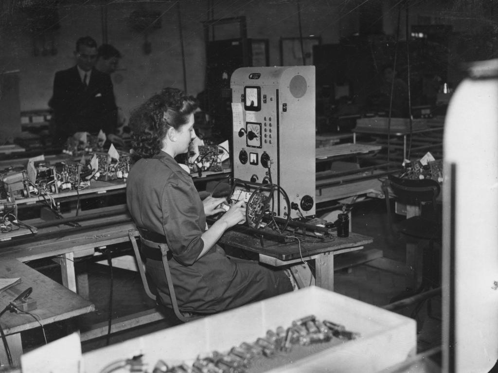Female worker testing Pye sets