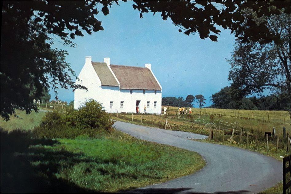 Postcard photograph of the relocated rectory at the Ulster Folk Museum